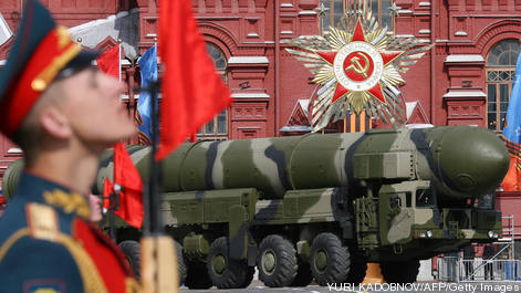 A Russian Topol-M ICBM drives across Red