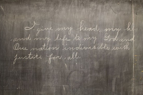"I give my head my heart and my life to my God and one nation indivisible with justice for all." - Uncovered classroom chalkboard from 1917