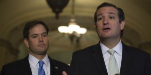 Senator Ted Cruz, a Republican from Texas, right, speaks during a news conference with Senator Marco Rubio, a Republican from Florida, following a vote in Washington, D.C., U.S., on Friday, Sept. 27, 2013. The U.S. Senate voted to finance the government through Nov. 15 after removing language to choke off funding for the health care law, putting pressure on the House to avoid a federal shutdown set to start Oct. 1. Photographer: Andrew Harrer/Bloomberg via Getty Images