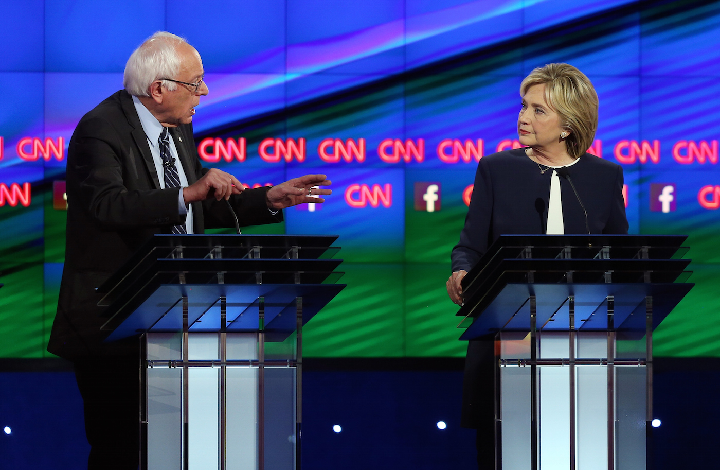 LAS VEGAS, NV - OCTOBER 13: Democratic presidential candidates Sen. Bernie Sanders (I-VT) (L) and Hillary Clinton take part in a presidential debate sponsored by CNN and Facebook at Wynn Las Vegas on October 13, 2015 in Las Vegas, Nevada. Five Democratic presidential candidates are participating in the party's first presidential debate. (Photo by Joe Raedle/Getty Images)