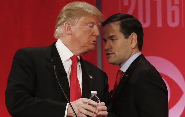 Trump and Rubio speak during commercial break at GOP Debate via statesman.com